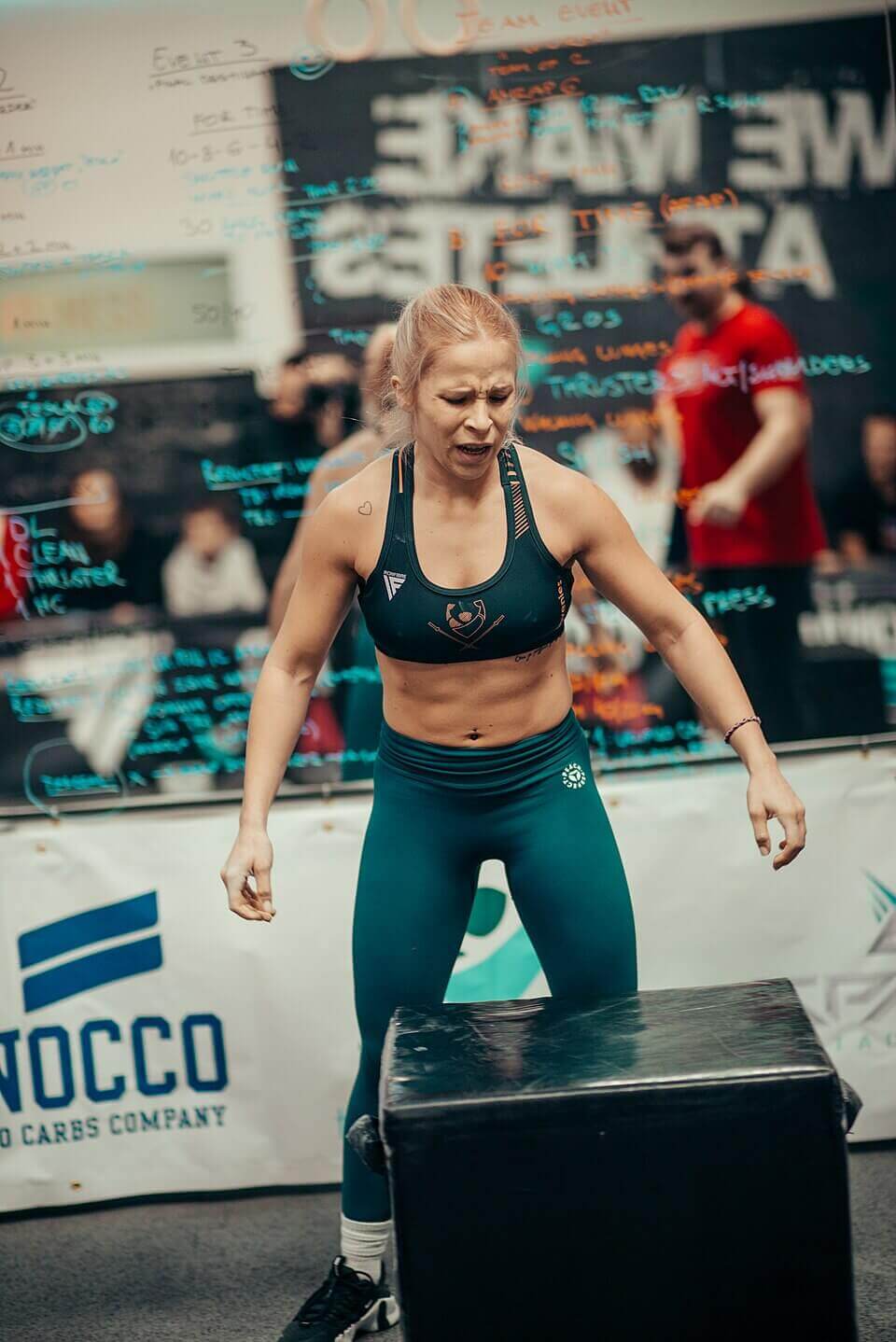 An athlete performing explosive box jump training