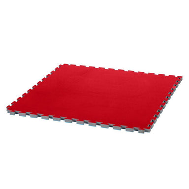 A red interlocking foam floor mat with gray interlocking edges, shown at an angle on a plain white background.