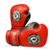 Red boxing gloves with a brand logo on a white background