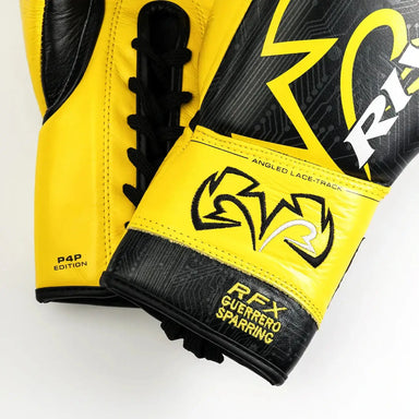 Yellow and black boxing glove with brand logo on a white background