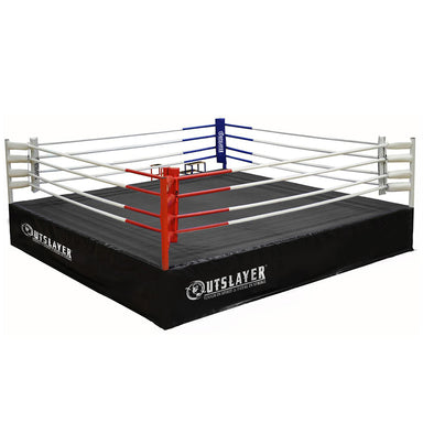 A black, elevated drop-n-lock boxing ring with red and blue corner posts and white ropes.